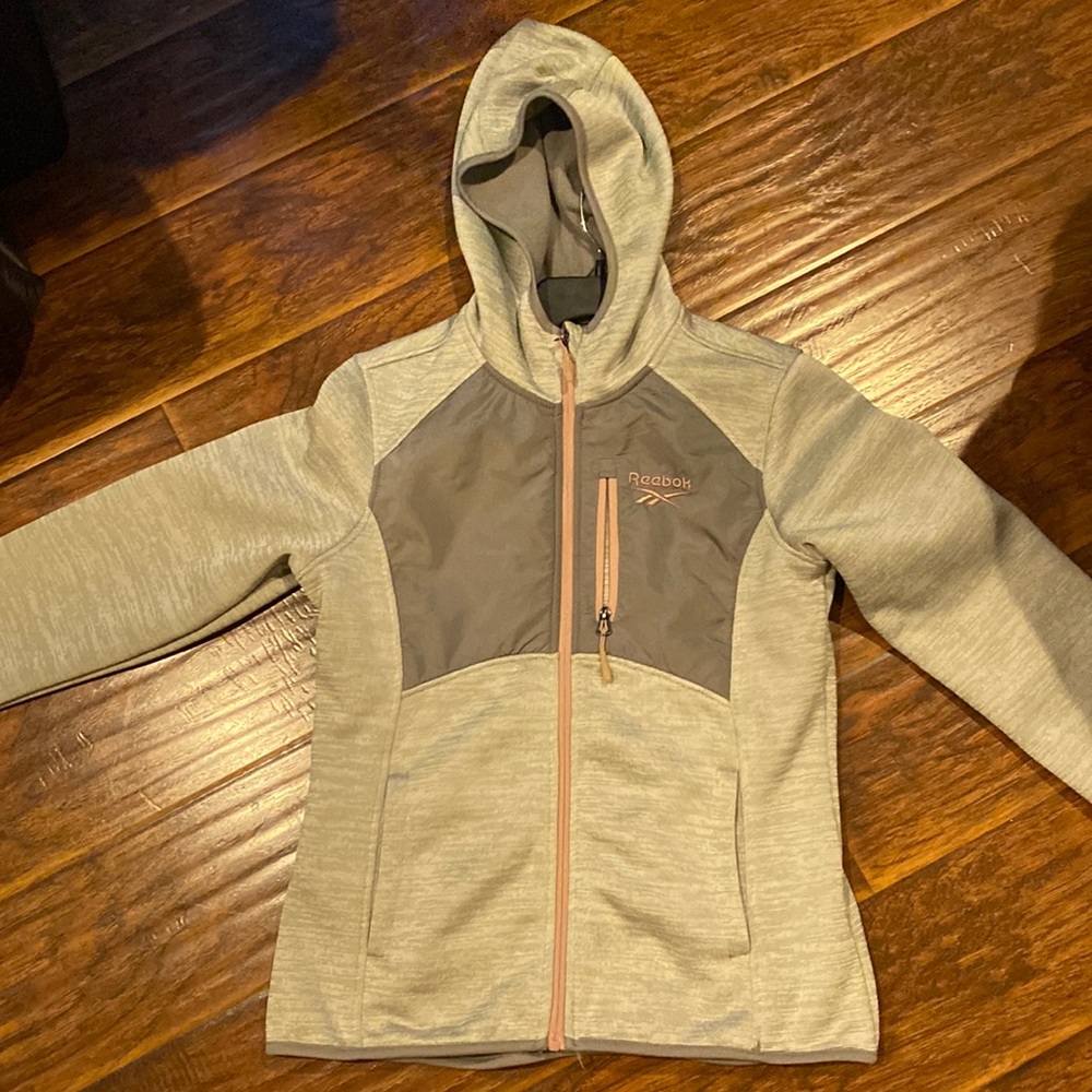 Reebok  women's gray jacket with pink zippers